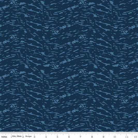 Image of the Ocean Oasis Waves Navy quilting cotton fabric by Diane Labombarbe for Riley Blake Designs. Features waves on a blue background. Cute Little Fabric Shop