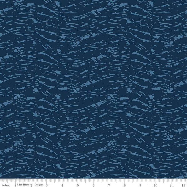 Image of the Ocean Oasis Waves Navy quilting cotton fabric by Diane Labombarbe for Riley Blake Designs. Features waves on a blue background. Cute Little Fabric Shop
