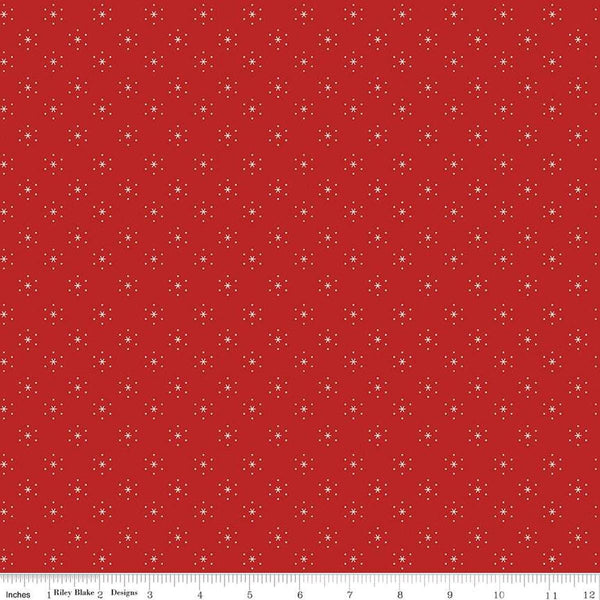 Image of the Americana Sparkle Schoolhouse quilting cotton fabric by Lori Holt for Riley Blake Designs. Features stars on a red background. Cute Little Fabric Shop