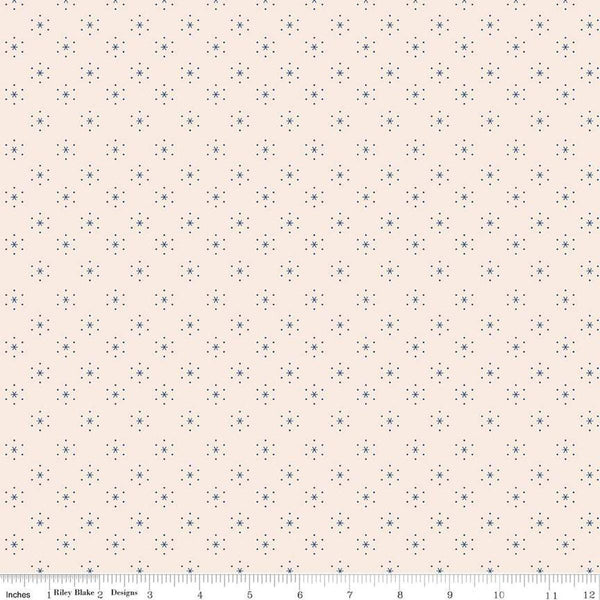 Image of the Americana Sparkle Latte quilting cotton fabric by Lori Holt for Riley Blake Designs. Features stars on a cream background. Cute Little Fabric Shop