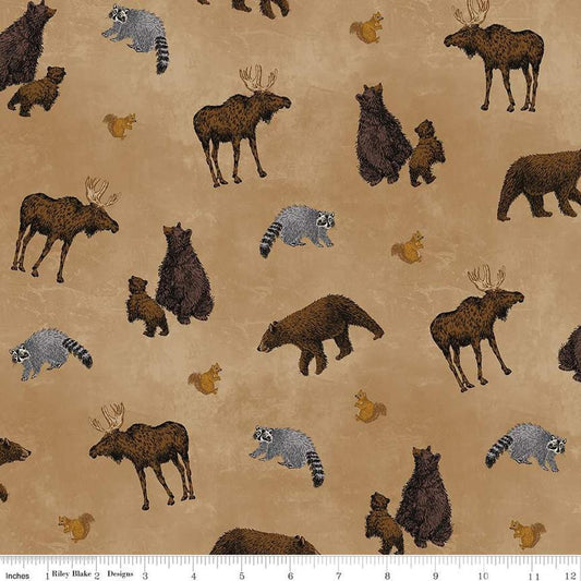 Image of the Pine Grove Animal Toss Tan quilting cotton fabric by Riley Blake Designs. Features animals on a brown background. Cute Little Fabric Shop