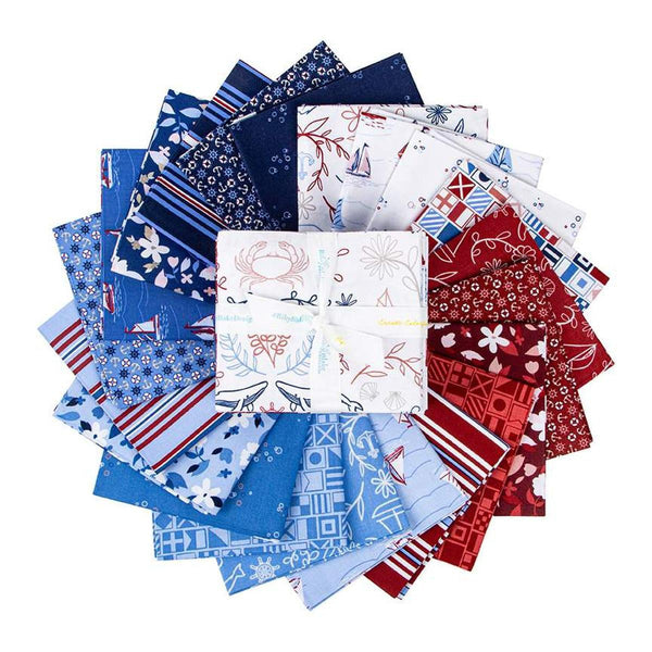 Image of the Yacht Club Fat Quarter Bundle by Amanda Niederhauser for Riley Blake Designs. Features boating themed fabrics on various backgrounds. Cute Little Fabric Shop