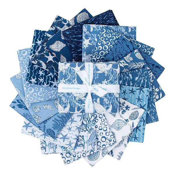Image of the Ocean Oasis fat quarter bundle by Diane Labombarbe for Riley Blake Designs. Features blue ocean themed fabrics on blue backgrounds. 
Cute Little Fabric Shop