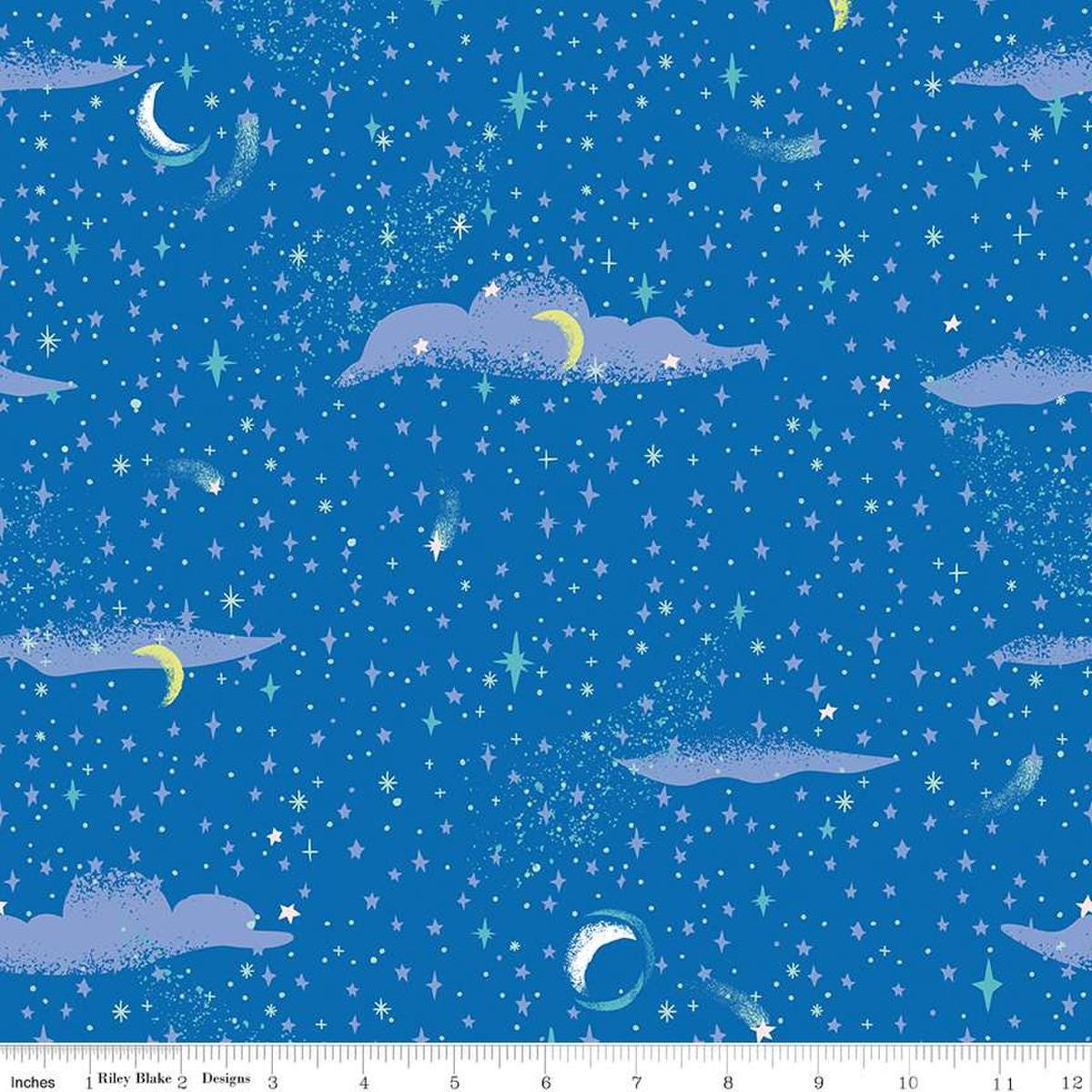 Image of the Forever Neverland Pixie Dust Sapphire quilting cotton fabric by Jill Howarth for Riley Blake Designs. Features a sky on a blue background. Cute Little Fabric Shop