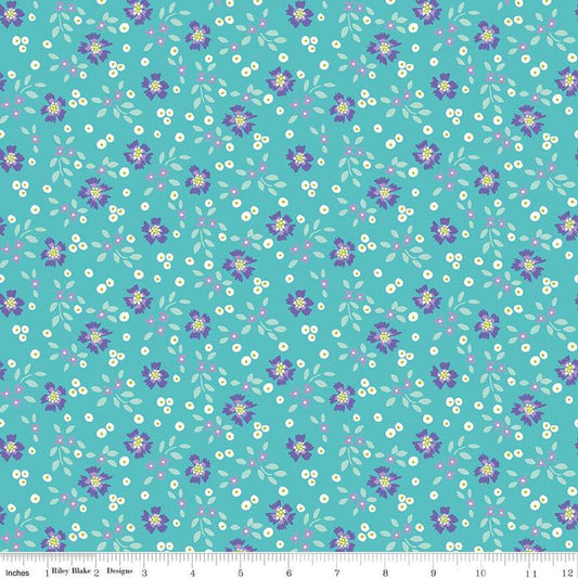 Image of the Vibrance Abloom Peacock quilting cotton fabric by Leslie Ryan for Riley Blake Designs. Features flowers on a blue background. Cute Little Fabric Shop