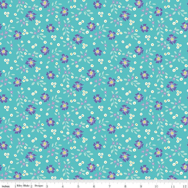 Image of the Vibrance Abloom Peacock quilting cotton fabric by Leslie Ryan for Riley Blake Designs. Features flowers on a blue background. Cute Little Fabric Shop