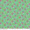 Image of the Vibrance Abloom Alpine quilting cotton fabric by Leslie Ryan for Riley Blake Designs. Features flowers on a green background. Cute Little Fabric Shop