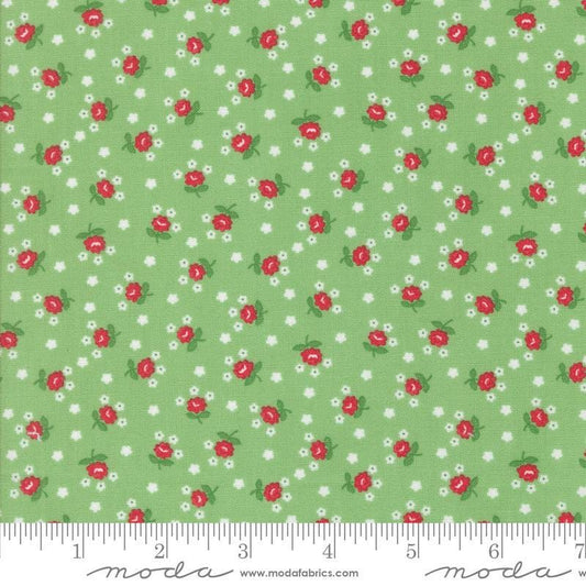 Image of the Summertime Fairground Green quilting cotton fabric by Moda Fabrics. Features flowers on an green background. Cute Little Fabric Shop