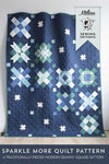 Image of the Sparkle More Quilt Pattern by Melissa Mortenson for Riley Blake Designs. Features granny squares on a quilt. 
Cute Little Fabric Shop