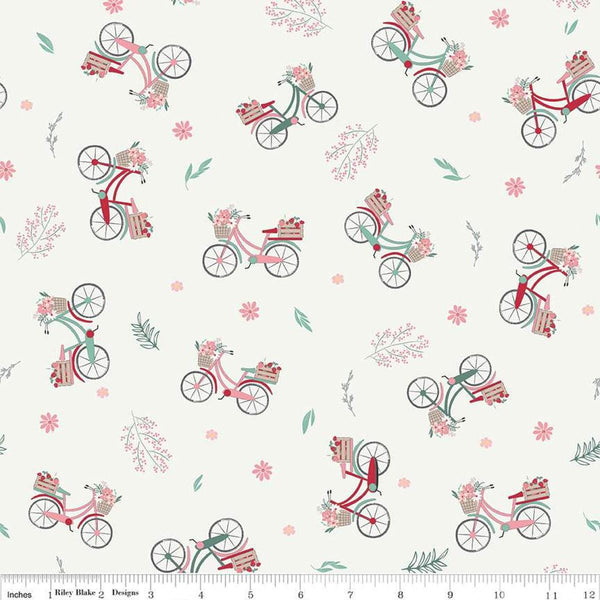 Image of the Berry Market Bicycles Sand Dollar quilting cotton fabric by Beverly McCullough for Riley Blake Designs. Features bikes on a cream background. Cute Little Fabric Shop
