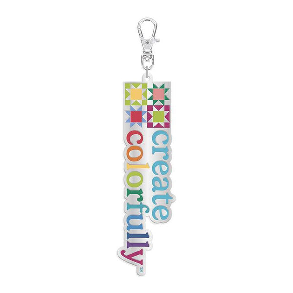 Image of the Create Colorfully Quilty™ Charm by Riley Blake Designs. Features a metal zipper pull. 
Cute Little Fabric Shop