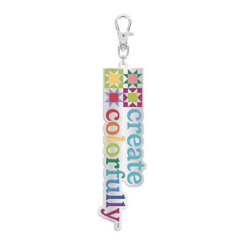Image of the Create Colorfully Quilty™ Charm by Riley Blake Designs. Features a metal zipper pull. 
Cute Little Fabric Shop