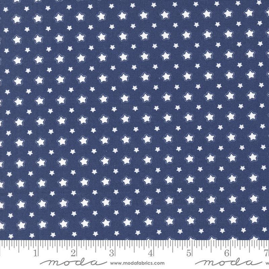 Image of the Star Spangled Folk Twilight quilting cotton fabric by Moda Fabrics. Features flowers on a blue background. Cute Little Fabric Shop