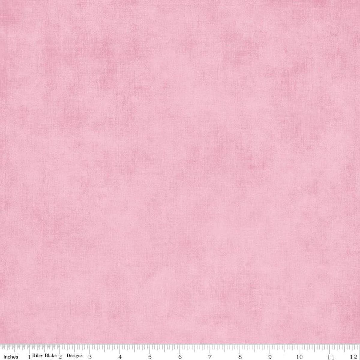 Image of the Wide Back Shades Carnation quilting cotton fabric by Riley Blake Designs. Features a textured fabric on a pink background. 
Cute Little Fabric Shop