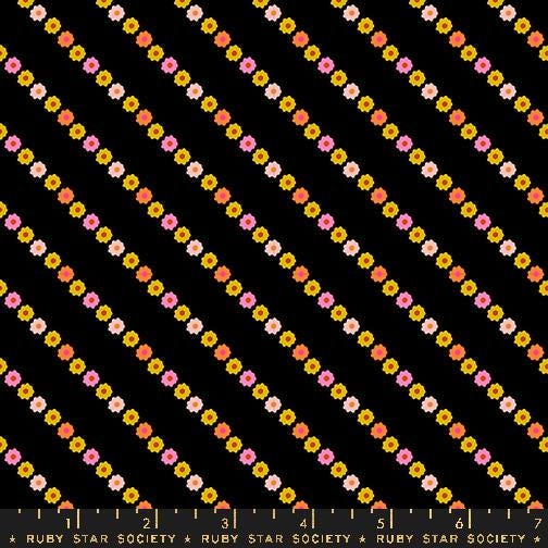Image of the Ooh Lucky Lucky Garland Black quilting cotton fabric by Ruby Star Society for Moda Fabrics. Features a floral stripe on a black background. Cute Little Fabric Shop