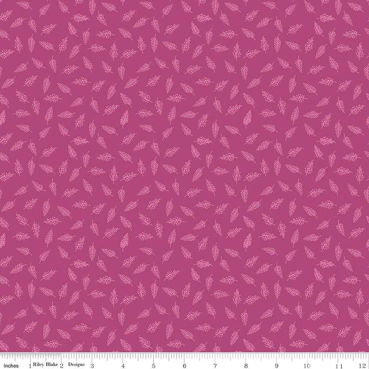 Image of the Morning Meadow Millet Orchid quilting cotton fabric. Features sprigs on a pink background. Cute Little Fabric Shop