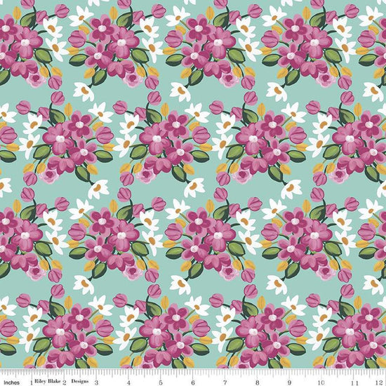 Image of the Morning Meadow Flower Bunches Julep quilting cotton fabric. Features flowers on a blue background. Cute Little Fabric Shop