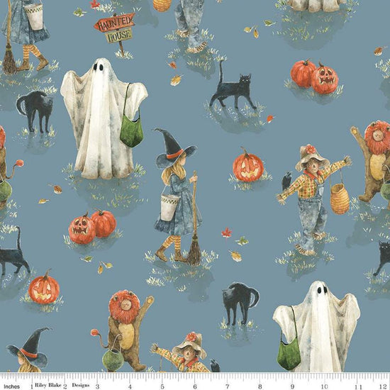 Image of the Trick or Treat Main Dusk quilting cotton fabric by Lisa Audit for Riley Blake Designs. Features halloween icons on a blue background. Cute Little Fabric Shop