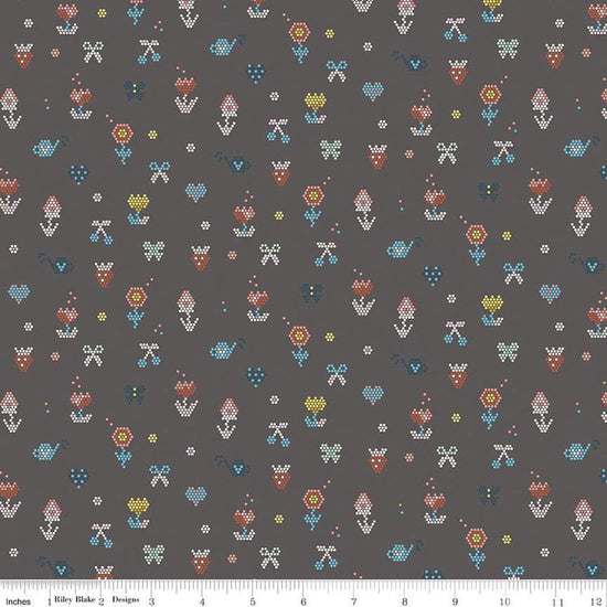 Image of the Sunsetridge Mosaic Granite quilting cotton fabric by Minki Kim for Riley Blake Designs. Features pixels on a brown background. Cute Little Fabric Shop