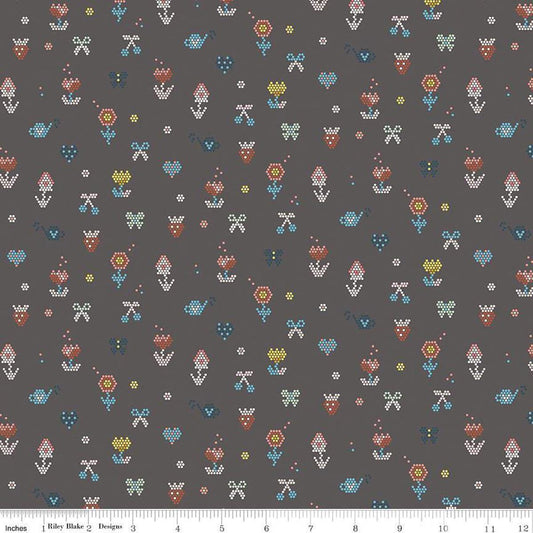 Image of the Sunsetridge Mosaic Granite quilting cotton fabric by Minki Kim for Riley Blake Designs. Features pixels on a brown background. Cute Little Fabric Shop