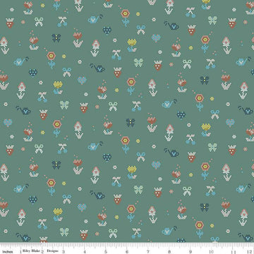 Image of the Sunsetridge Mosaic Lodge Pole quilting cotton fabric by Minki Kim for Riley Blake Designs. Features pixels on a green background. Cute Little Fabric Shop