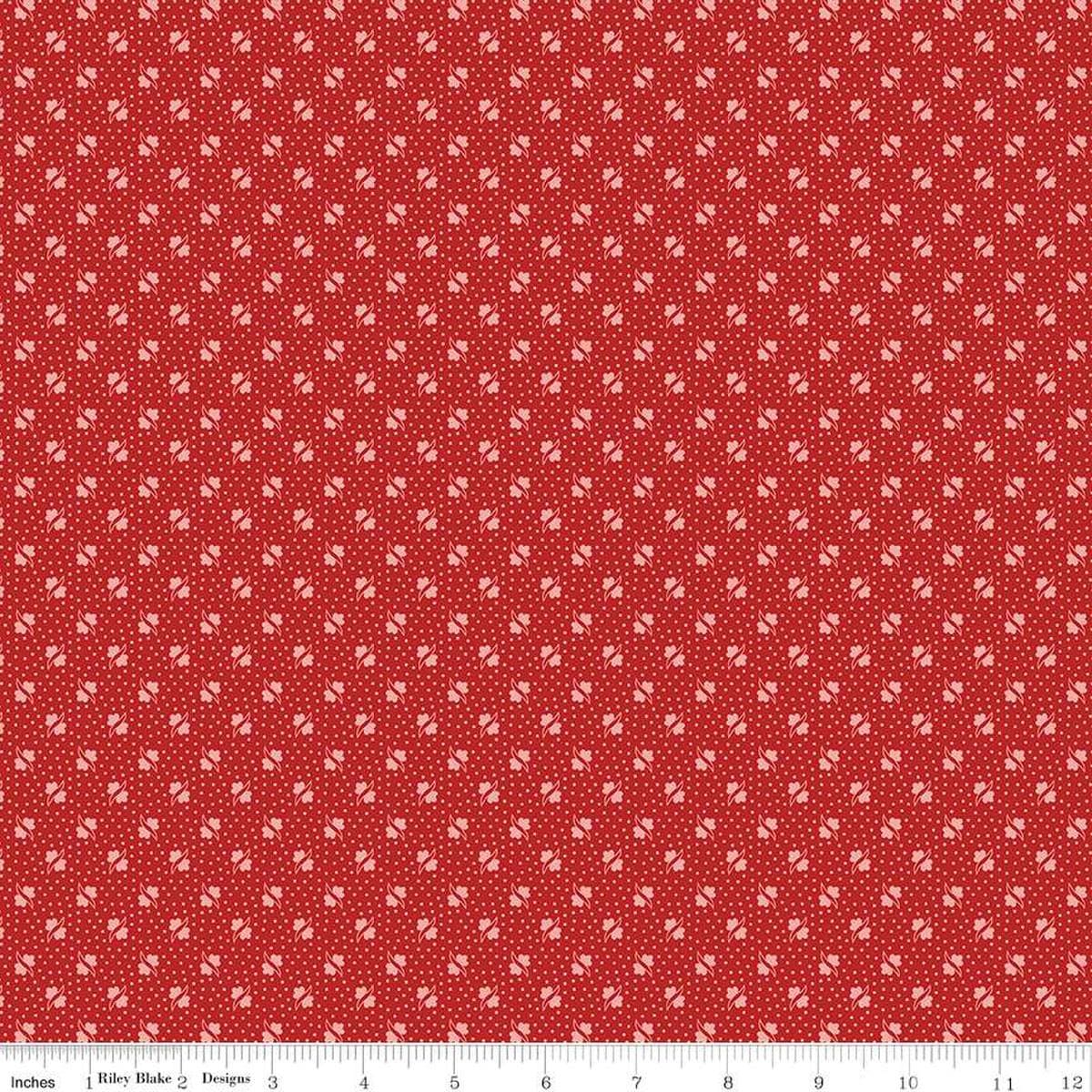 Image of the Americana Unity Schoolhouse quilting cotton fabric by Lori Holt for Riley Blake Designs. Features flowers on a red background. Cute Little Fabric Shop