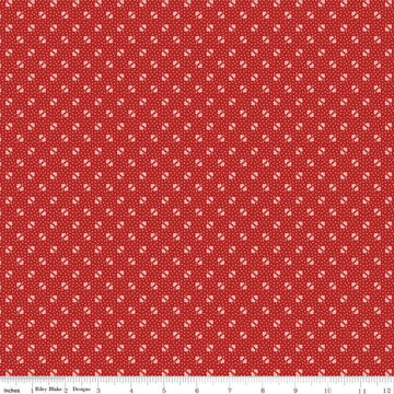 Image of the Americana Unity Schoolhouse quilting cotton fabric by Lori Holt for Riley Blake Designs. Features flowers on a red background. Cute Little Fabric Shop