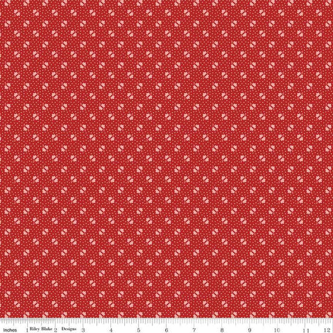 Image of the Americana Unity Schoolhouse quilting cotton fabric by Lori Holt for Riley Blake Designs. Features flowers on a red background. Cute Little Fabric Shop
