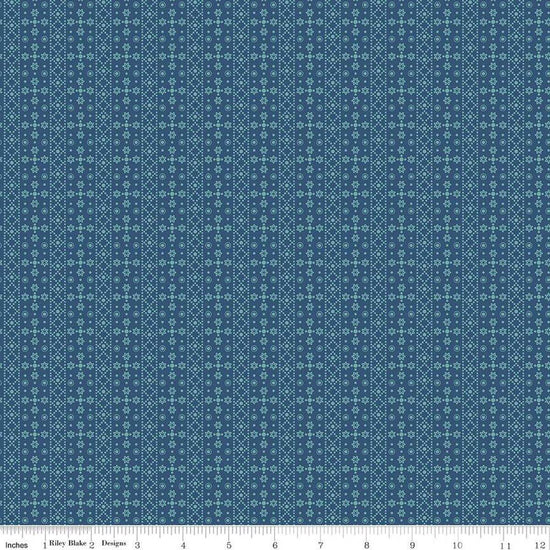 Image of the Americana Franklin Dark Denim quilting cotton fabric by Lori Holt for Riley Blake Designs. Features flowers on a blue background. Cute Little Fabric Shop