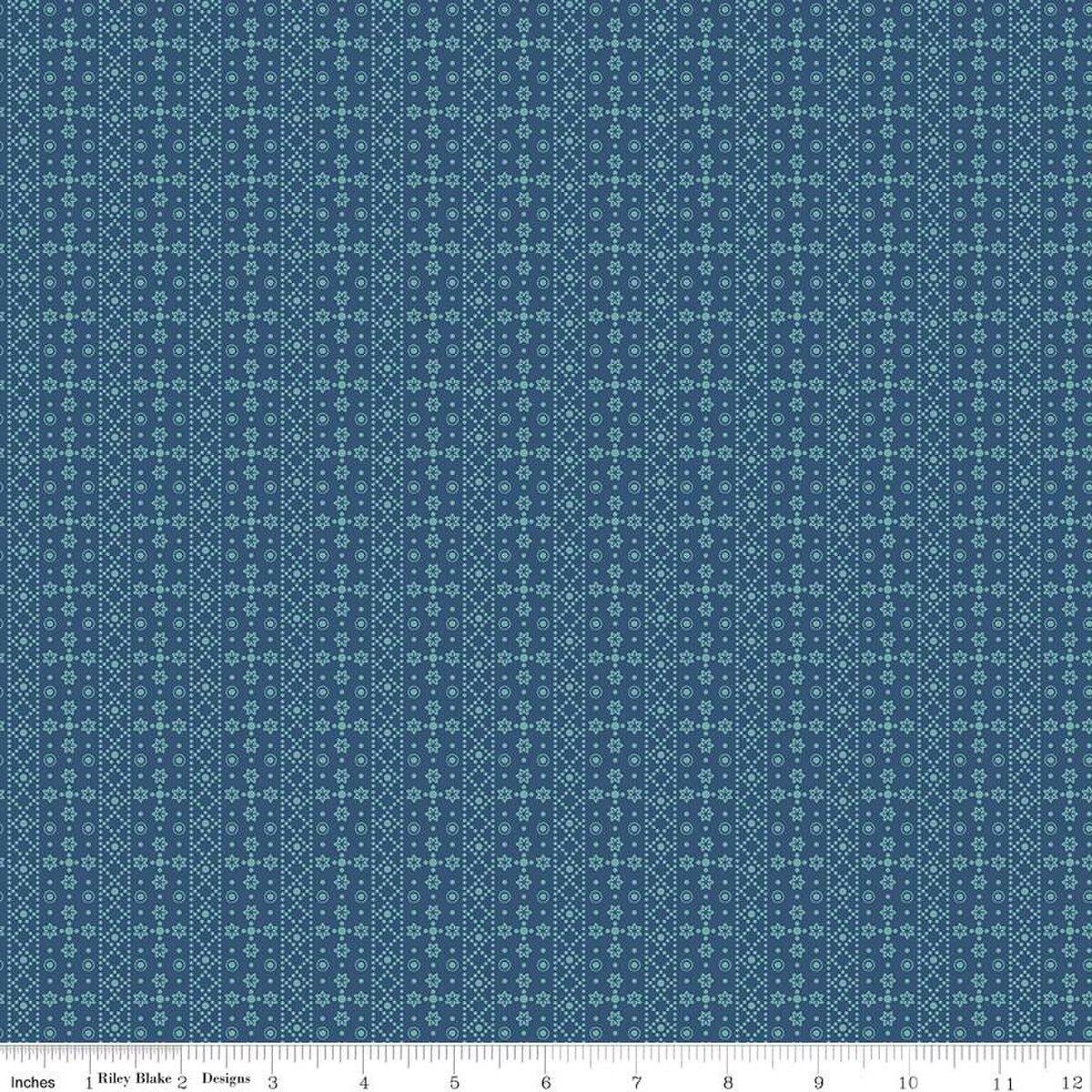Image of the Americana Franklin Dark Denim quilting cotton fabric by Lori Holt for Riley Blake Designs. Features flowers on a blue background. Cute Little Fabric Shop