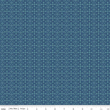 Image of the Americana Franklin Dark Denim quilting cotton fabric by Lori Holt for Riley Blake Designs. Features flowers on a blue background. Cute Little Fabric Shop