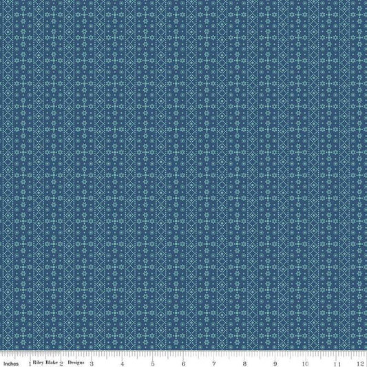 Image of the Americana Franklin Dark Denim quilting cotton fabric by Lori Holt for Riley Blake Designs. Features flowers on a blue background. Cute Little Fabric Shop