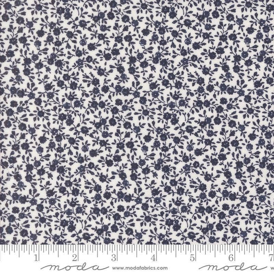 Image of the Summertime Bloom Cream Navy quilting cotton fabric by Moda Fabrics. Features flowers on a blue background. Cute Little Fabric Shop