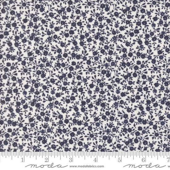 Image of the Summertime Bloom Cream Navy quilting cotton fabric by Moda Fabrics. Features flowers on a blue background. Cute Little Fabric Shop