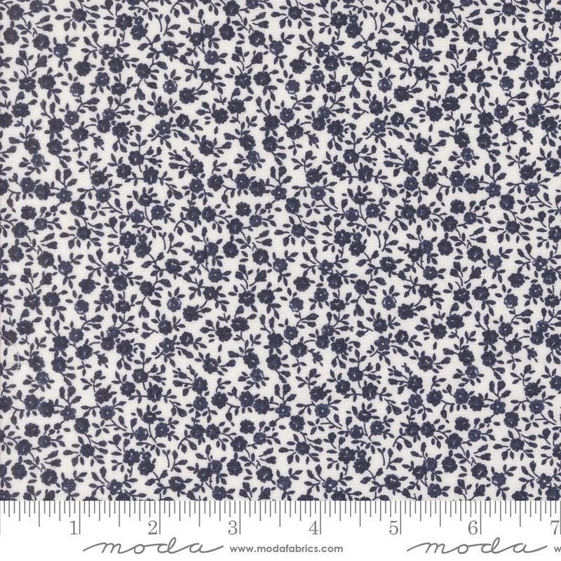 Image of the Summertime Bloom Cream Navy quilting cotton fabric by Moda Fabrics. Features flowers on a blue background. Cute Little Fabric Shop