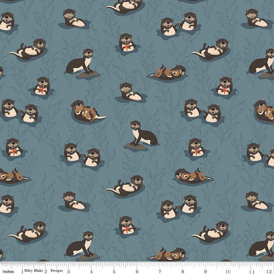 Image of the Alaska Sea Otters Blue quilting cotton fabric by Riley Blake Designs. Features animals on a blue background. Cute Little Fabric Shop