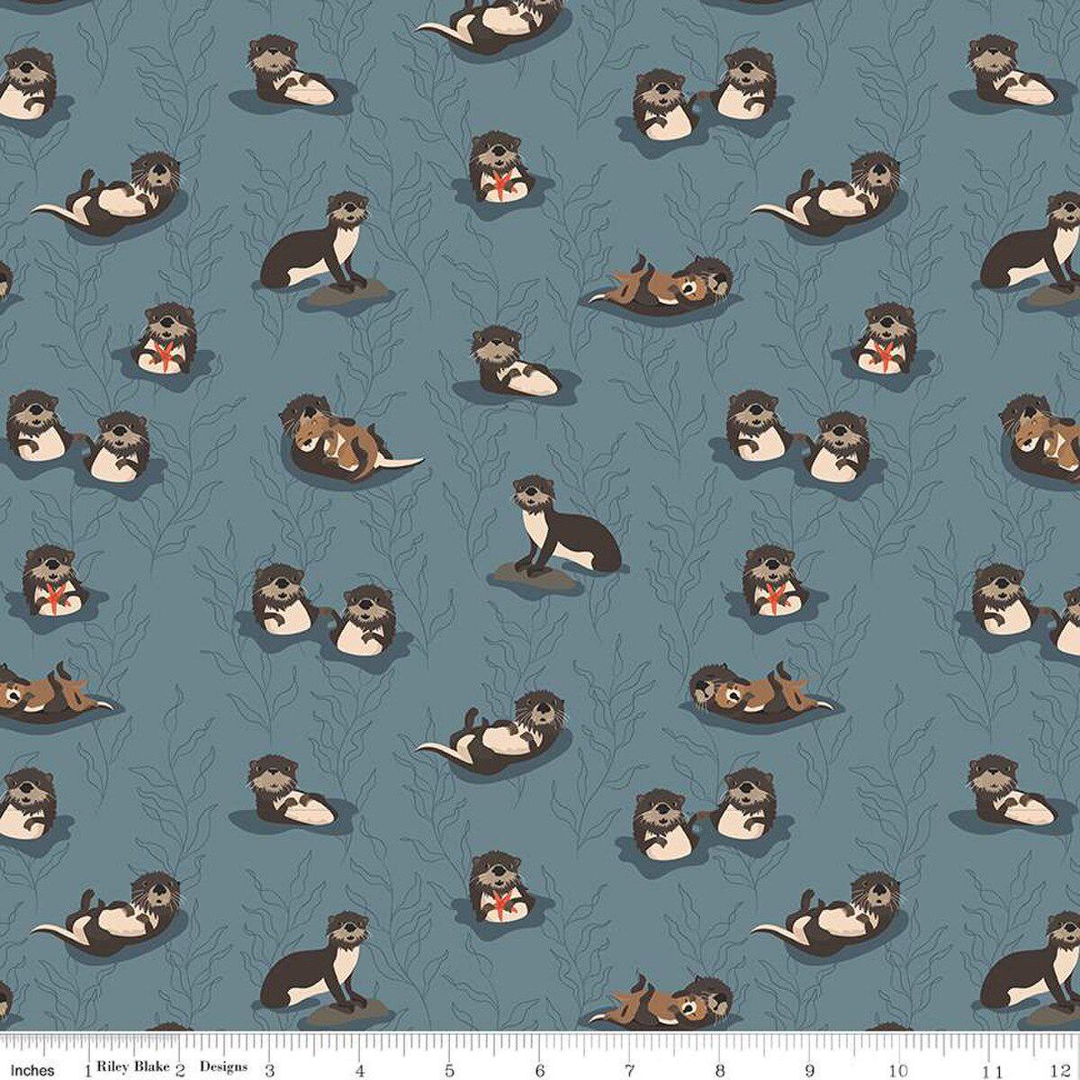 Image of the Alaska Sea Otters Blue quilting cotton fabric by Riley Blake Designs. Features animals on a blue background. Cute Little Fabric Shop