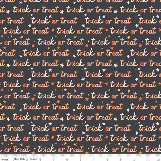 Image of the Hey Pumpkin Trick or Treat Charcoal quilting cotton fabric by Riley Blake Designs. Features text on a black background. Cute Little Fabric Shop