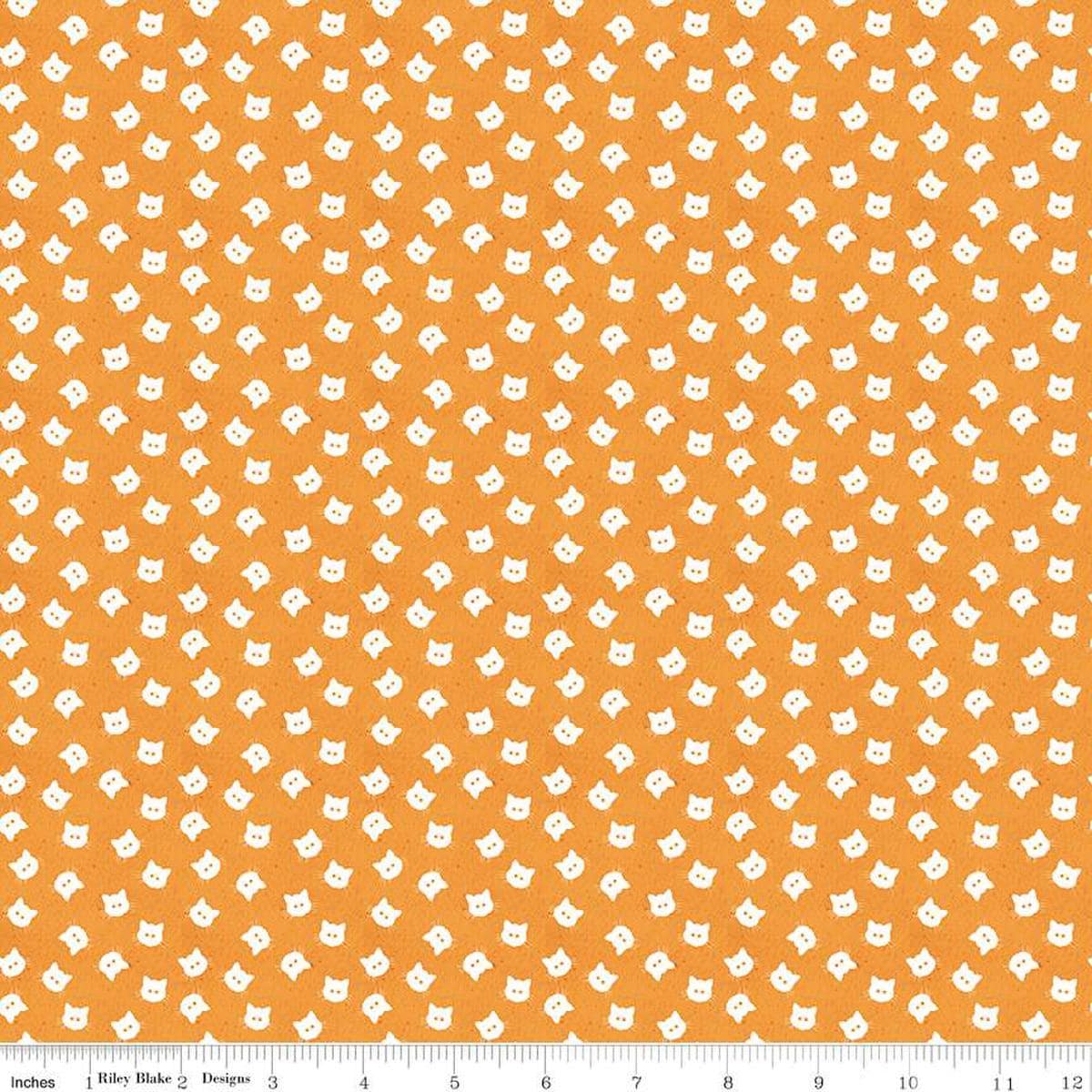 Image of the Costume Maker's Act II Scaredy Cat Buttons Orange quilting cotton fabric. Features cats on an orange background. Cute Little Fabric Shop