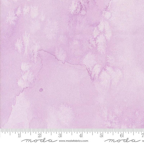 Image of the Wanderlust Flow Basics Lilac quilting cotton fabric. Features abstract paint on a pink background. Cute Little Fabric Shop