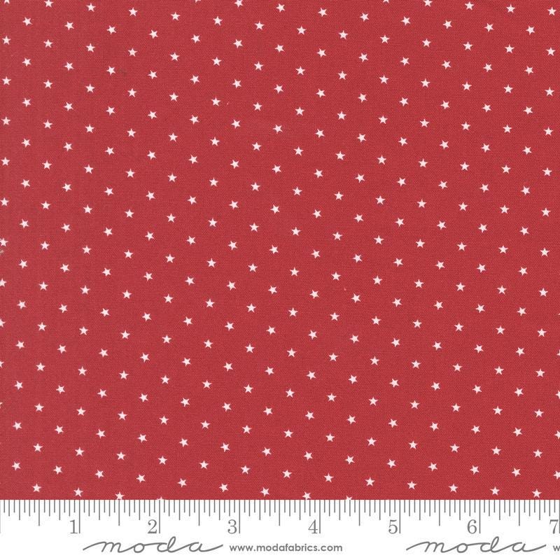 Image of the Star Spangled Twinkle Rocket quilting cotton fabric by Moda Fabrics. Features stars on a red background. Cute Little Fabric Shop