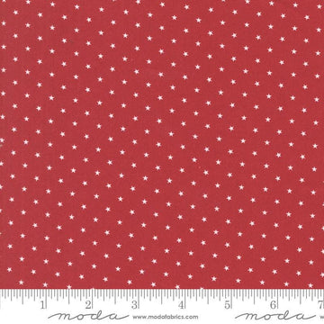 Image of the Star Spangled Twinkle Rocket quilting cotton fabric by Moda Fabrics. Features stars on a red background. Cute Little Fabric Shop