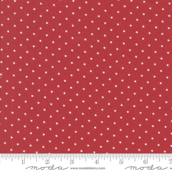 Image of the Star Spangled Twinkle Rocket quilting cotton fabric by Moda Fabrics. Features stars on a red background. Cute Little Fabric Shop
