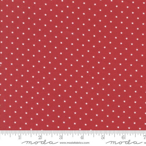 Image of the Star Spangled Twinkle Rocket quilting cotton fabric by Moda Fabrics. Features stars on a red background. Cute Little Fabric Shop