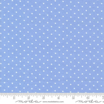 Image of the Star Spangled Twinkle Dawn quilting cotton fabric by Moda Fabrics. Features stars on a blue background. Cute Little Fabric Shop