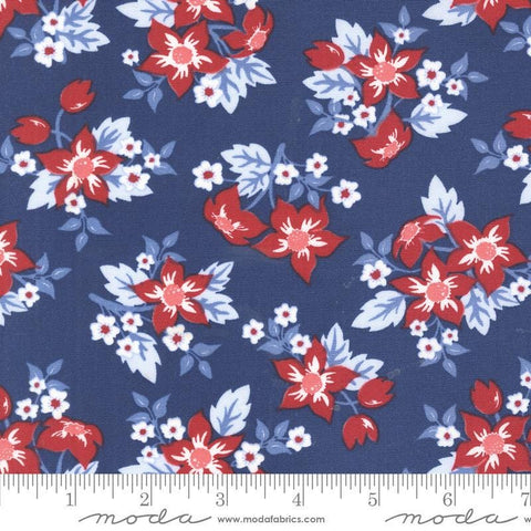 Image of the Star Spangled Flowers Twilight quilting cotton fabric by Moda Fabrics. Features flowers on a blue background. Cute Little Fabric Shop