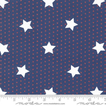 Image of the Star Spangled Stars Twilight quilting cotton fabric by Moda Fabrics. Features stars on a blue background. Cute Little Fabric Shop