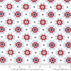 Image of the Star Spangled Bandana Patriotic quilting cotton fabric by Moda Fabrics. Features flowers on a white background. Cute Little Fabric Shop
