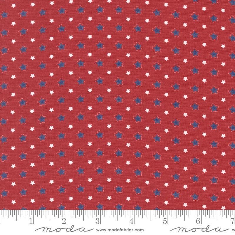 Image of the Star Spangled Folk Rocket quilting cotton fabric by Moda Fabrics. Features stars on a red background. Cute Little Fabric Shop