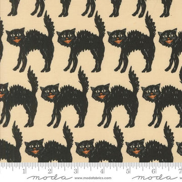 Image of the Home Sweet Haunt Black Cat Bone quilting cotton fabric by Moda Fabrics. Features scats on a green background. Cute Little Fabric Shop